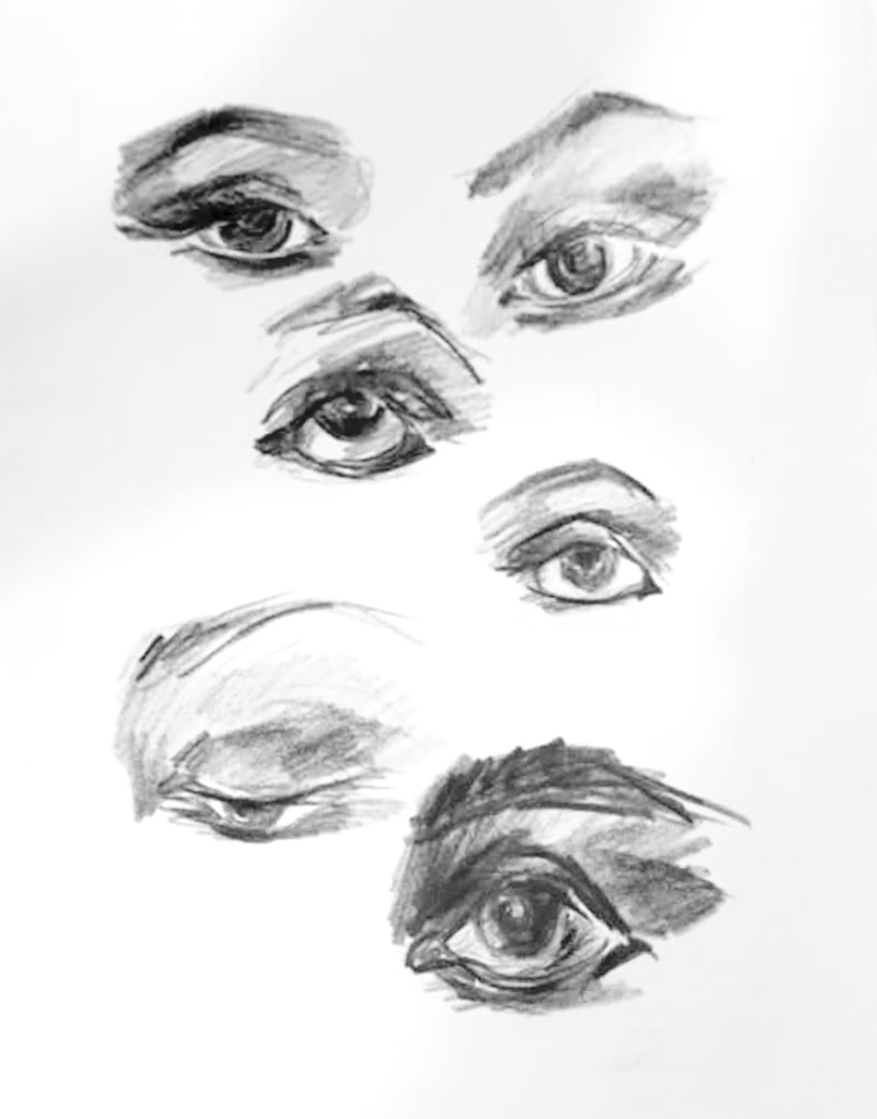 Eyes sketch — charcoal studies of eyes in various angles