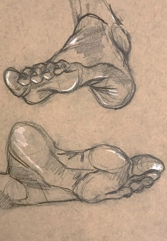 Feet study — detailed charcoal drawing of feet on kraft paper
