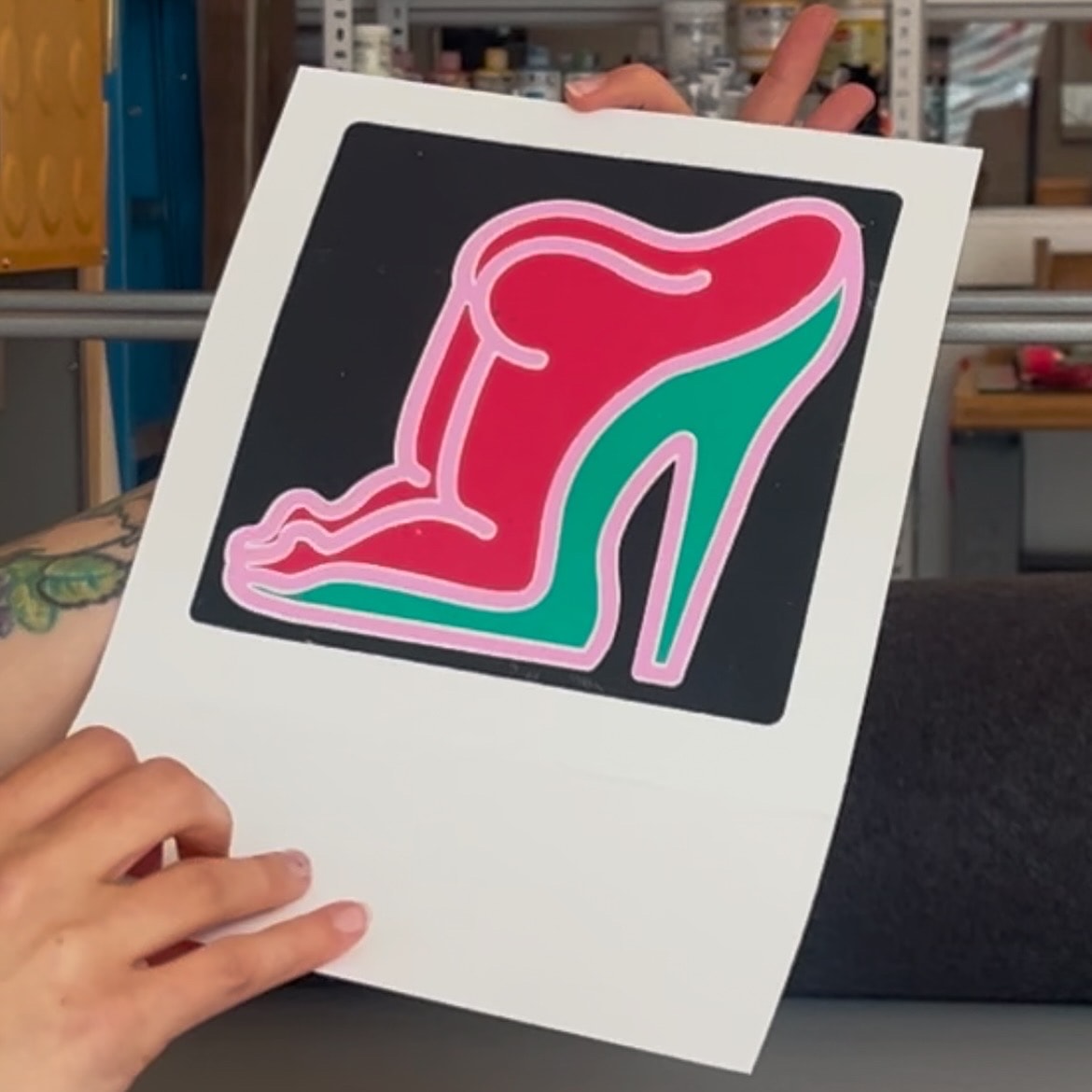 Kaitlyn Heger holding a print — Those Shoes