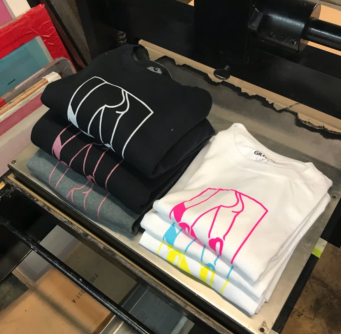Screen-printed t-shirts fresh off the press